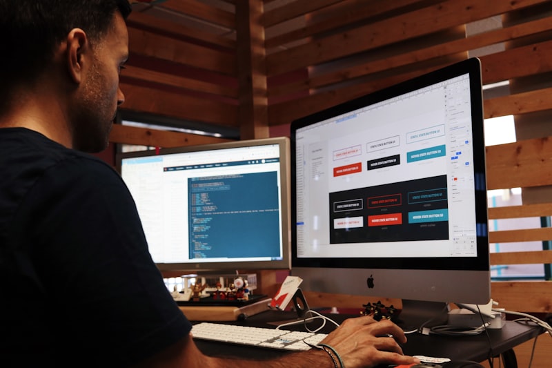 Small business owner planning digital marketing strategy on laptop in modern office