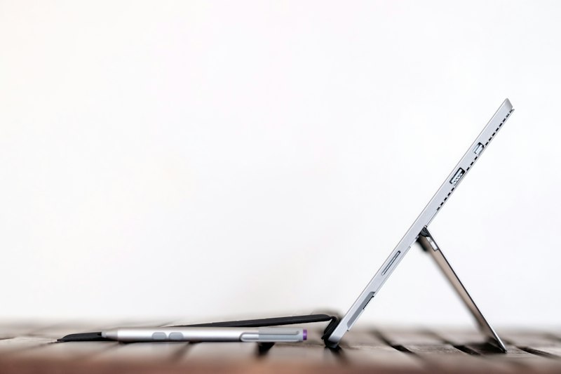 eCommerce business owner reviewing long-term sales growth strategy and analytics charts
