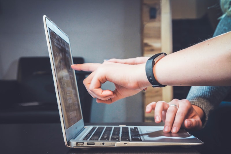 eCommerce manager reviewing online store analytics and product performance on laptop