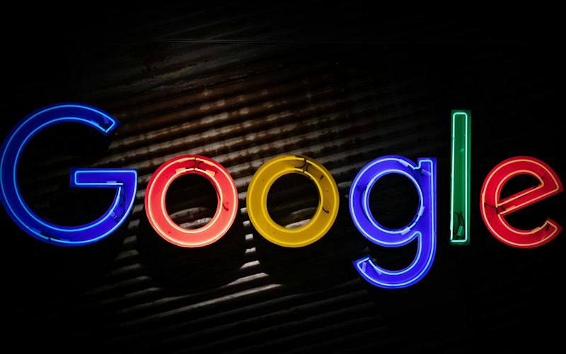 Digital marketer reviewing Google Ads campaign performance and bidding strategy on screen