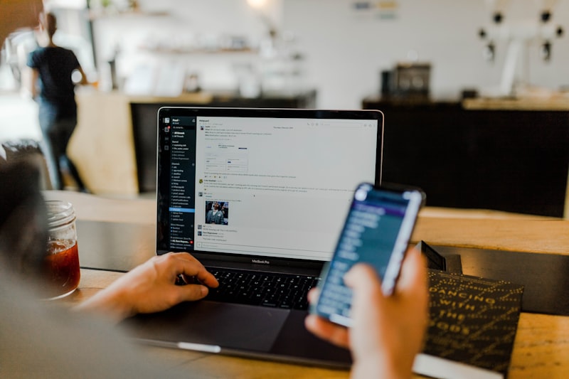 Marketing professional using AI-powered campaign analytics and automation tools on screen